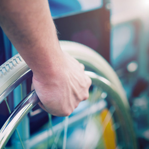 detail-disabled-man-wheelchair_53419-2505